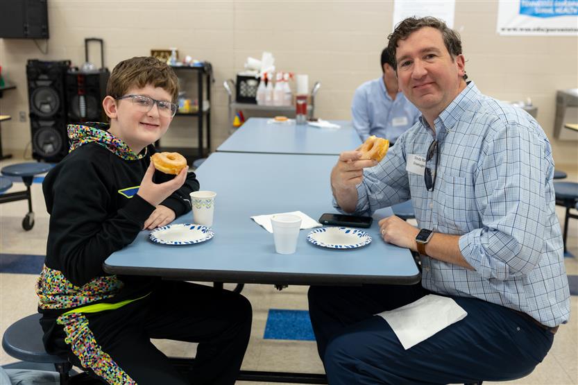 Sunset Elementary hosts Donuts with Grown-Ups